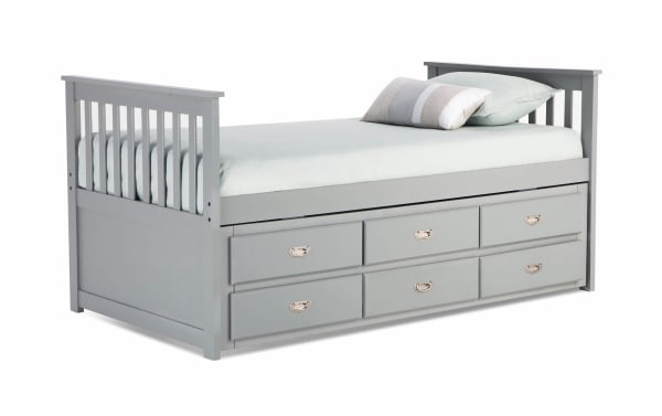 Chadwick Twin Gray Storage Captain Bed with Twin Trundle in transitional style, made of MDF, poplar solids, and veneers. Features six built-in drawers with silver handles for clothing and shoe storage. Gray finish with slatted headboard and footboard, designed for kid’s bedrooms and sleepovers.