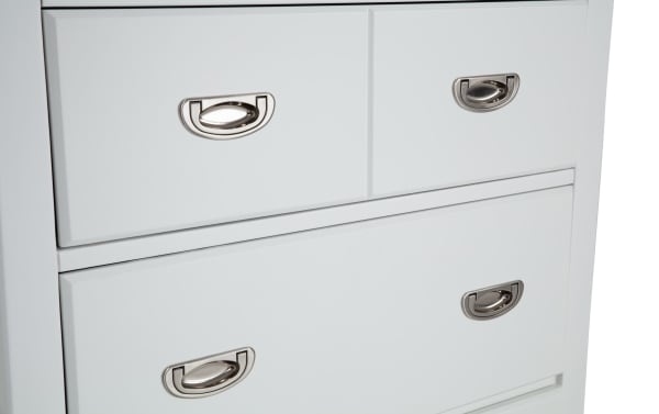 Chadwick White 4 Drawer Chest in transitional style, made of MDF, poplar solids, and veneers, with metal cup drawer pulls and felt-lined drawers for child’s room storage.