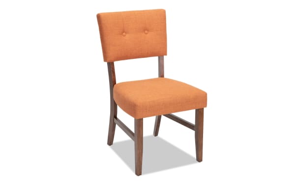 Bettie Walnut & Russet Panel Back Upholstered Dining Chair in russet orange fabric, mid-century modern style with button tufting, walnut veneer legs, and memory foam seat for comfort.