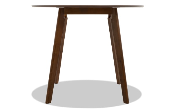 Mid-century modern Bettie Walnut Round Counter Height Dining Table with flared rubberwood legs and walnut finish, ideal for small dining spaces.