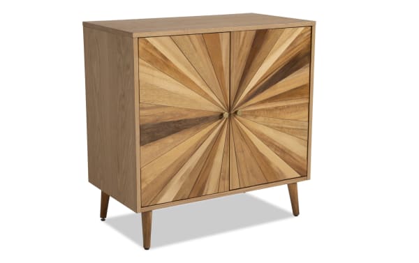 Starburst Natural 2 Door Cabinet in contemporary style with MDF and acacia veneers, featuring a sunburst wood pattern and tapered legs.