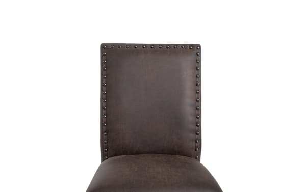 Canyon Brown faux leather counter height stool with solid back, nailhead trim, and rustic style from the Canyon Dining collection.
