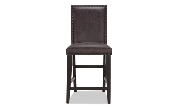 Canyon Gray Faux Leather solid back counter height stool with rustic dark wood legs, gray faux leather upholstery, and nailhead trim from Canyon Dining collection.