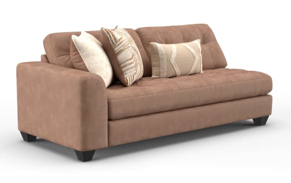 Modern brown leather sofa with tufted cushions, wide armrest, and three decorative beige and patterned throw pillows, ideal for living room seating.