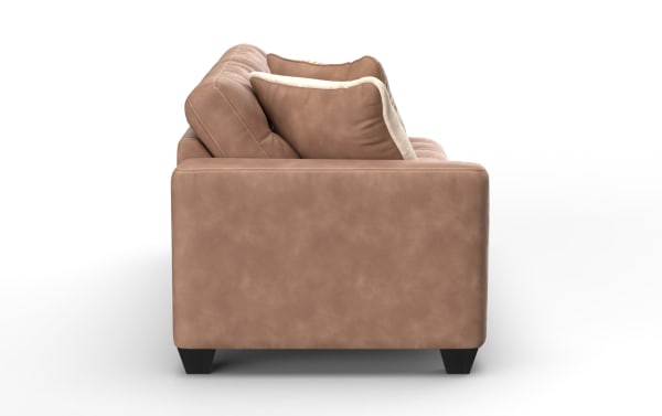 Modern brown leather sofa side view showing plush cushions, soft texture, and dark wooden legs, ideal for contemporary living rooms.
