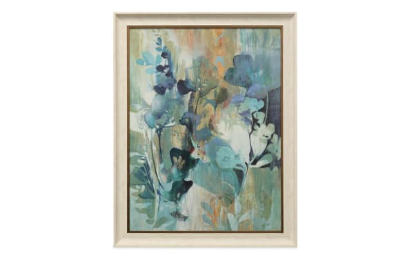 Botanical Illusion Framed Art features multicolored contemporary floral canvas with blue, green, and orange hues, perfect for springtime wall decor.