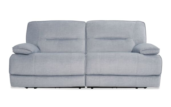Silver Pacifica 82" power reclining loveseat in transitional style with plush polyester fabric, memory foam cushions, and built-in USB charging.