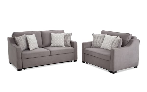 Gray Bob-O-Pedic® 73'' queen pop-up sleeper sofa and chair set in transitional style with polyester fabric, slope arms, and accent pillows.