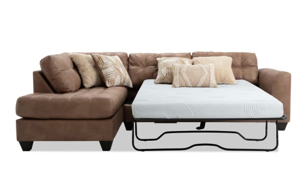 Sierra Cognac 118'' 2 Piece Left Arm Facing Sleeper Chaise Sectional in brown polyester fabric with tufted cushions, accent pillows, and full gel memory foam mattress.