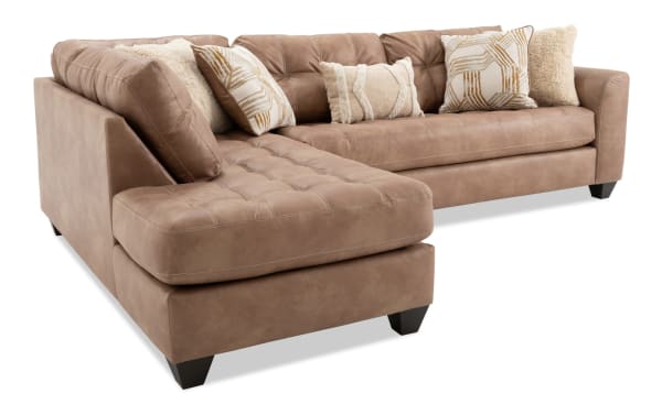 Sierra Cognac 118" 2-piece left arm facing sleeper chaise sectional in brown polyester fabric with tufted cushions, accent pillows, and gel memory foam mattress.