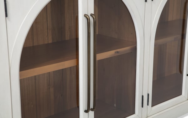White 4 Door Arch Cabinet in contemporary style with MDF frame, glass arch doors, and acacia plank interior shelves for display and storage.