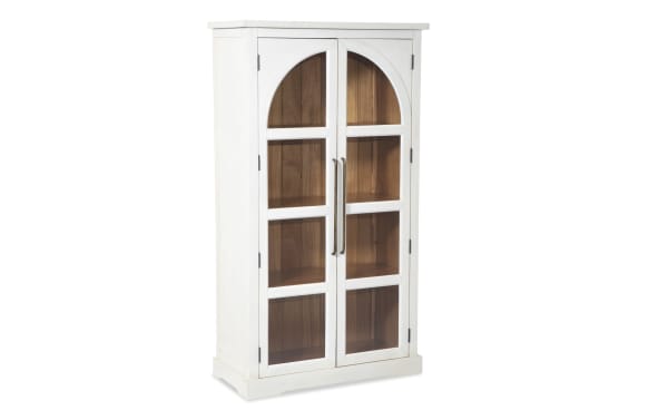 White 2 Door Tall Arch Cabinet in contemporary style, made of MDF with acacia plank interior, featuring glass display doors and metal handles.