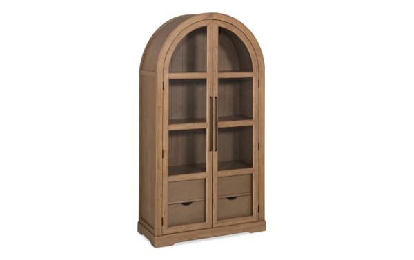 Natural 2 Door Arch Bookcase Cabinet in natural MDF with contemporary style, featuring tall arched frame, glass paneled doors, and two lower drawers.