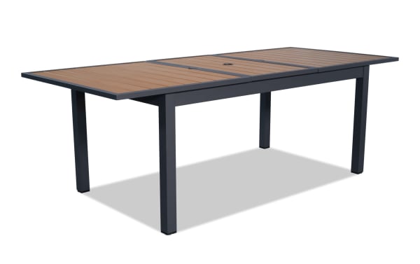 Laguna Gray Aluminum Outdoor Extension Dining Table with powder-coated metal frame, contemporary style, and self-storing extendable leaf for patio use.