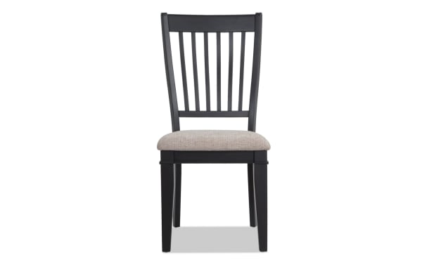 Montana Dining rustic slat back dining chair with beige polyester fabric upholstery, black rubberwood frame, and memory foam seat cushion.