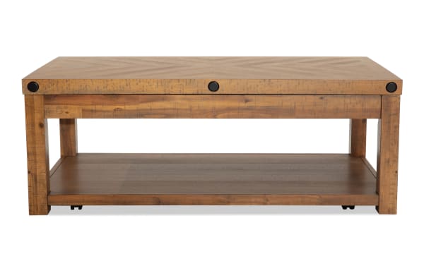 Rustic Sonoma Natural Lift-Top Storage Coffee Table with acacia veneers, distressed wood, black metal accents, casters, and lower shelf for storage.