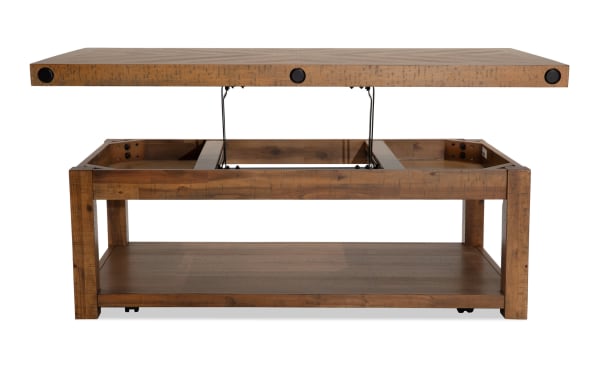 Rustic Sonoma Natural Lift-Top Storage Coffee Table in acacia veneers with distressed wood, black metal lift mechanism, and lower shelf for storage.