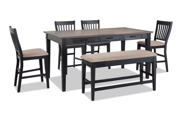 Montana 6 Piece Rustic Counter Height Dining Set with black rubberwood base, beige polyester upholstered seats, oak veneer tabletop, and storage bench with memory foam seating.