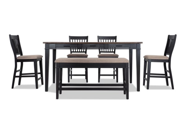 Montana 6 Piece Rustic Counter Height Dining Set with black rubberwood frame, oak veneer top, beige polyester upholstered chairs, and storage bench.