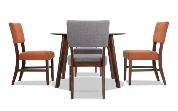 Bettie 5 Piece Walnut, Russet & Gray Upholstered Round Dining Set with mid-century modern rubberwood frame, russet polyester tufted chairs, gray memory foam seat chair, and walnut veneer round table.