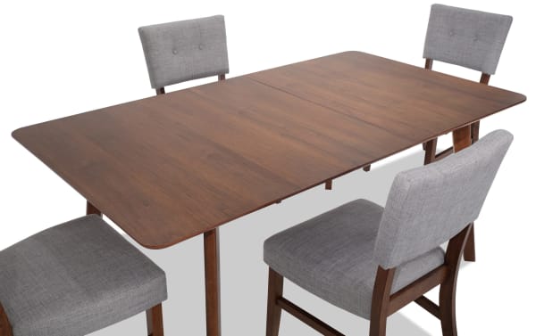 Bettie 5 Piece Walnut & Gray Upholstered Extendable Dining Set with mid-century modern style, gray polyester fabric, button tufting, and walnut veneer tabletop.