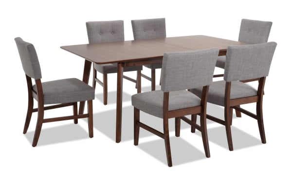 Bettie 7 Piece Walnut & Gray Upholstered Extendable Dining Set with mid-century modern style, gray polyester fabric, button tufting, flared legs, and removable 12" leaf.