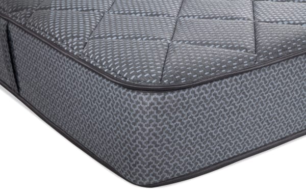Synergy 10'' Full Firm Boxed Mattress with gray quilted top and patterned side panels, featuring firm support and breathable foam layers.