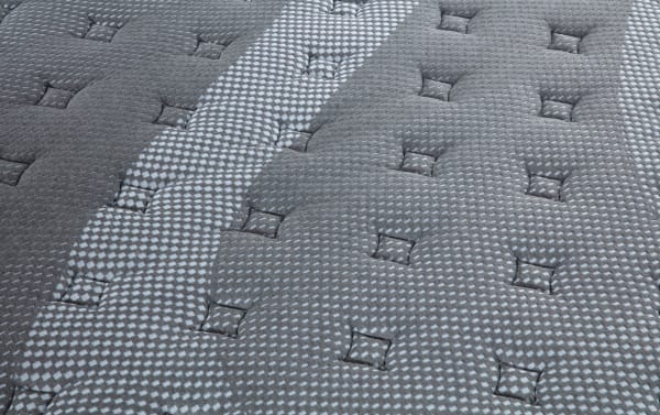 Synergy 11'' Twin XL Plush Boxed Mattress with gray quilted fabric, textured diamond pattern, and tufted squares for plush comfort and support.