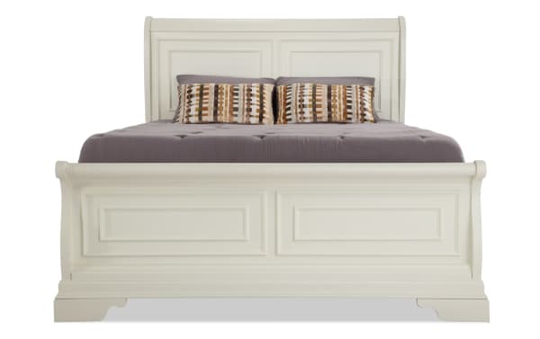 Louie Louie White King Sleigh Bed in traditional style, featuring white veneers, Asian hardwood solids, MDF, with rectangular panel details on headboard and footboard.