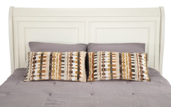 Louie Louie White King Sleigh Bed with traditional rectangular paneled headboard, made of Asian hardwood solids, veneers, and MDF, featuring a subtle rub-through finish.