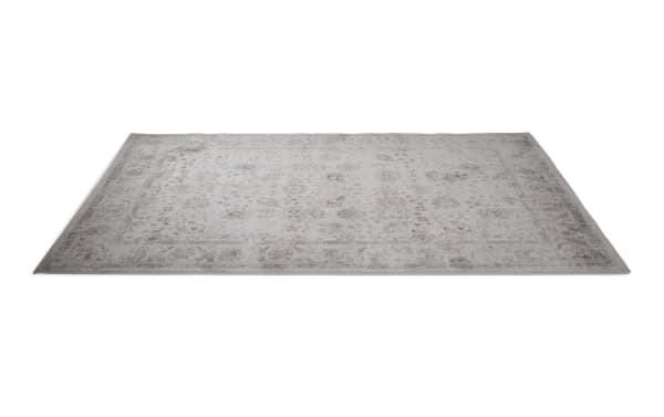 Emery 5' x 8' Multi Floral Rug in soft multicolored polypropylene with floral patterns inspired by sand and sea, adding cozy texture.