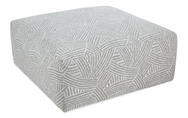 Sofia Gray Cocktail Ottoman in gray polyester fabric with a transitional style, oversized plush design for seating or footrest.