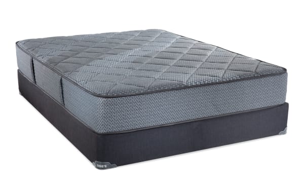 Synergy 10'' Queen Firm Standard Mattress Set by Bob’s with gray quilted top, patterned sides, and dark fabric foundation. Features gel memory foam and wrapped coil support.