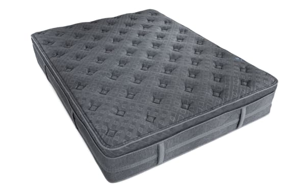Treasure 12.5'' Queen Pillow Top Plush Mattress in dark gray with quilted knit cover, plush pillow top, and reinforced edge support from the Treasure collection.