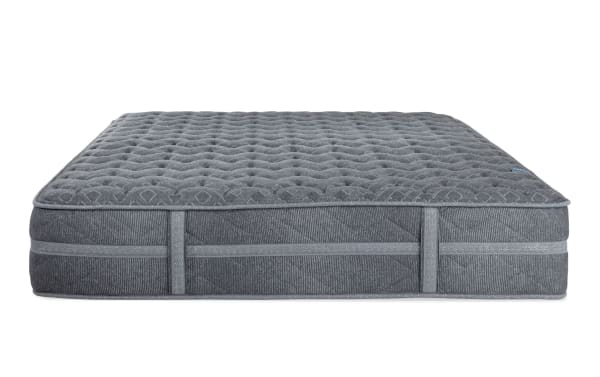 Treasure Boxed 11.5'' Twin Extra Firm Mattress in gray with quilted knit cover, gel-infused foam layers, and firm coil system for support and durability.