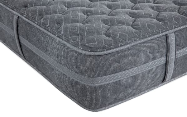 Treasure Boxed 11.5'' Twin Extra Firm Mattress in gray with quilted knit cover, gel-infused foam layers, and wrapped coil system for firm support.