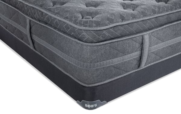 Treasure 12.5" Twin Pillow Top Plush Low Profile Mattress Set in gray with quilted knit cover, gel memory foam, and firm edge support by Bob's.