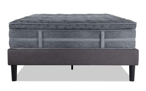 Treasure 11.5'' Full Cushion Firm Universal Mattress Set in gray with quilted knit cover, gel-infused foam, memory foam, and firm coil support on a dark gray upholstered foundation.