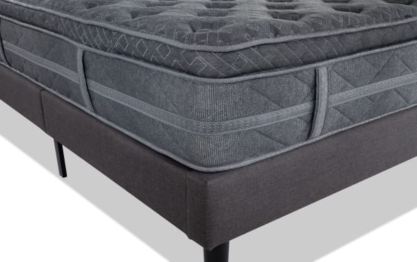 Treasure 11.5'' Full Cushion Firm Universal Mattress Set in dark gray with quilted knit cover, gel-infused foam, and firm perimeter coils on fabric foundation.