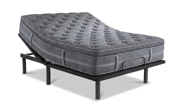 Queen-sized Power Bob Essential Base with Treasure 12.5" Queen Pillow Top Plush Mattress, featuring a white quilted knit cover and adjustable black metal base with wired remote and head-up motion.