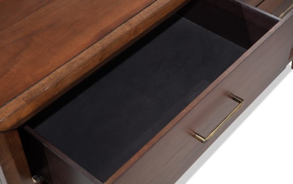 Open drawer of Bettie Brown 6 Drawer Dresser showing black felt-lined interior, walnut veneer finish, and mid-century modern brass handle.