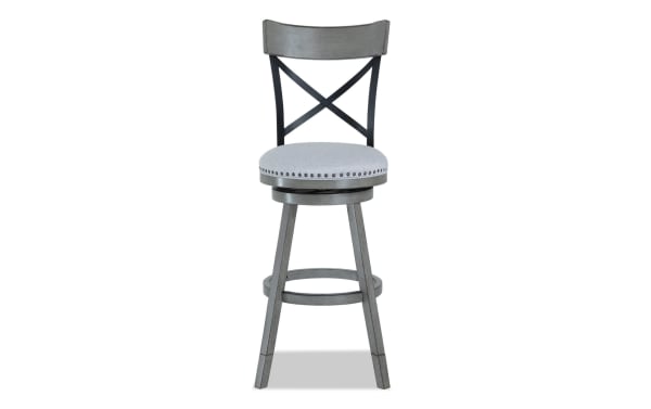 Iris Gray Cross Back Upholstered Adjustable Height Swivel Stool with gray polyester fabric seat, nailhead trim, and gray wood legs in transitional style
