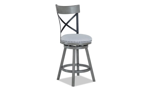 Gray Iris Dining Iris Gray Cross Back Upholstered Adjustable Height Swivel Stool with nailhead trim, polyester fabric seat, and rubberwood frame in transitional style