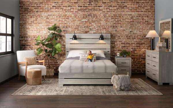 Rustic Foundry Twin White Storage Platform Bed in MDF with paneled slat design, black lamps, USB port, and extra storage from Foundry Bedroom collection.