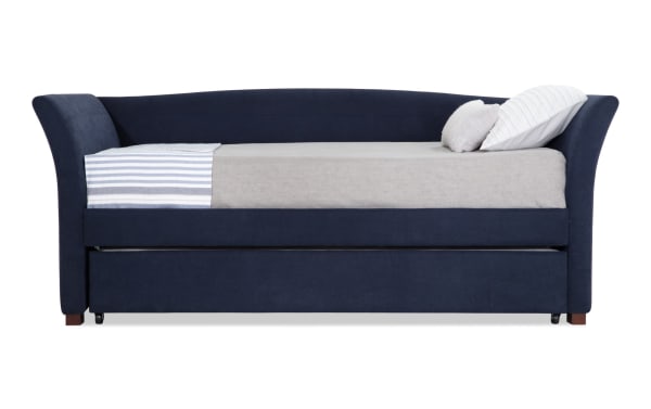 Chadwick Twin Navy Upholstered Daybed with Twin Trundle in transitional style, navy blue polyester fabric, curved arms, and extra sleeping/storage space.