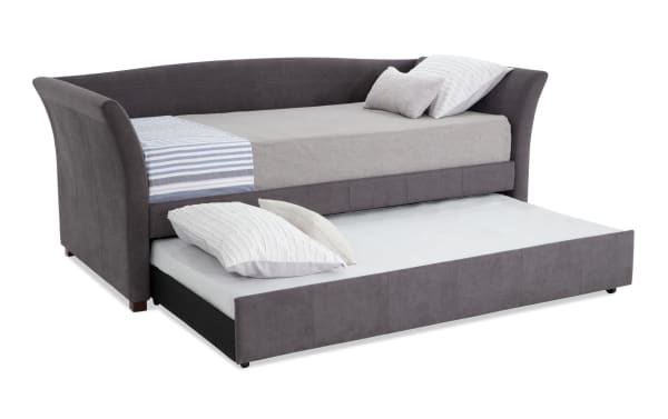 Chadwick Twin Gray Upholstered Daybed with Trundle features gray polyester fabric, transitional style, curved arms, and includes two mattresses for versatile seating and sleeping.