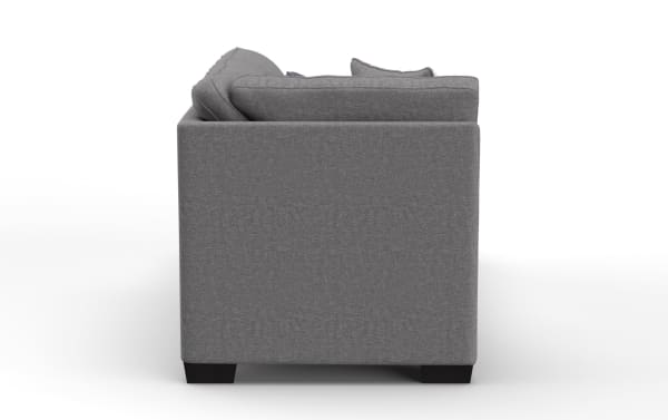 Modern gray fabric sofa side view with clean lines, square armrests, and black wooden legs, suitable for contemporary living rooms.