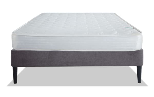 Perfection 6.5'' Full Firm Universal Mattress Set with white quilted innerspring mattress and gray upholstered platform bed frame with black tapered legs.