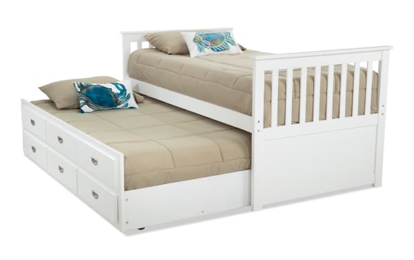 Chadwick Twin White Storage Captain Bed with Twin Trundle in transitional style, made of MDF, poplar solids, and veneers, featuring built-in storage drawers and a pull-out trundle for extra sleeping space.