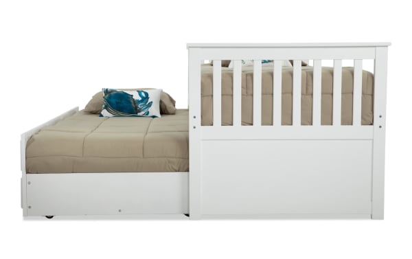 Chadwick Twin White Storage Captain Bed with Twin Trundle in transitional style, made of MDF, poplar solids, and veneers, featuring built-in storage and a pull-out trundle for extra sleeping space.